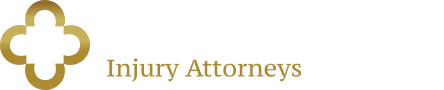 Logo featuring a gold and black cross symbol with white and gold text reading "Injury Attorneys.