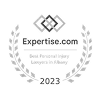 Black and white circular emblem with geometric shapes and stylized text.